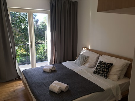 Comfort Apartment, 1 Bedroom, Garden View, Beachside | 1 bedroom, hypo-allergenic bedding, pillowtop beds, iron/ironing board