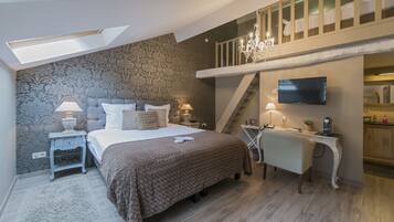 Standaard eenpersoonskamer | Luxe beddengoed, donsdekens, een minibar, een kluis op de kamer