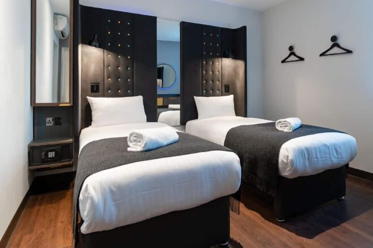 In-room safe, blackout drapes, WiFi (free), bed sheets