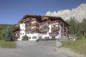 Experience the charm of the mountains at this traditional hotel, surrounded by scenic cliffs and forest.