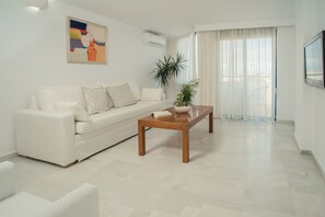 Deluxe Duplex, Partial Sea View | Living area