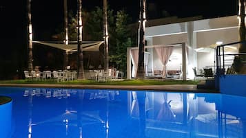 Outdoor pool, open 8:00 AM to 8:00 PM, pool umbrellas, sun loungers