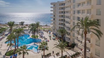 Outdoor pool, open 10:00 AM to 6:00 PM, pool umbrellas, pool loungers