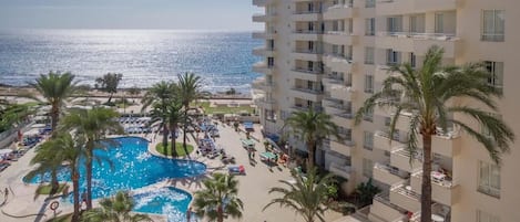 Outdoor pool, open 10:00 AM to 6:00 PM, pool umbrellas, sun loungers