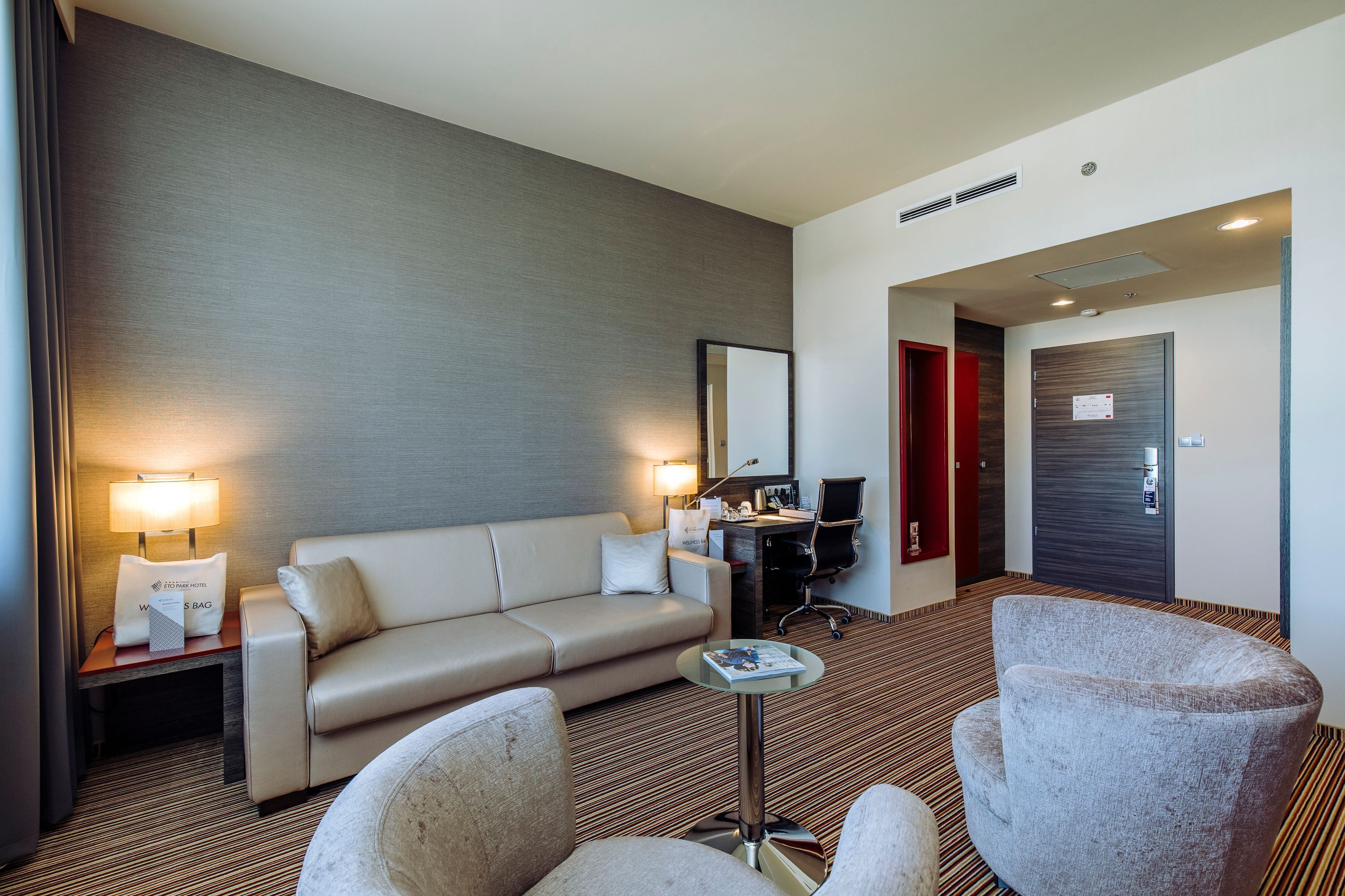 executive suite stadium view | living area | 55-cm lcd tv with cable channels, tv