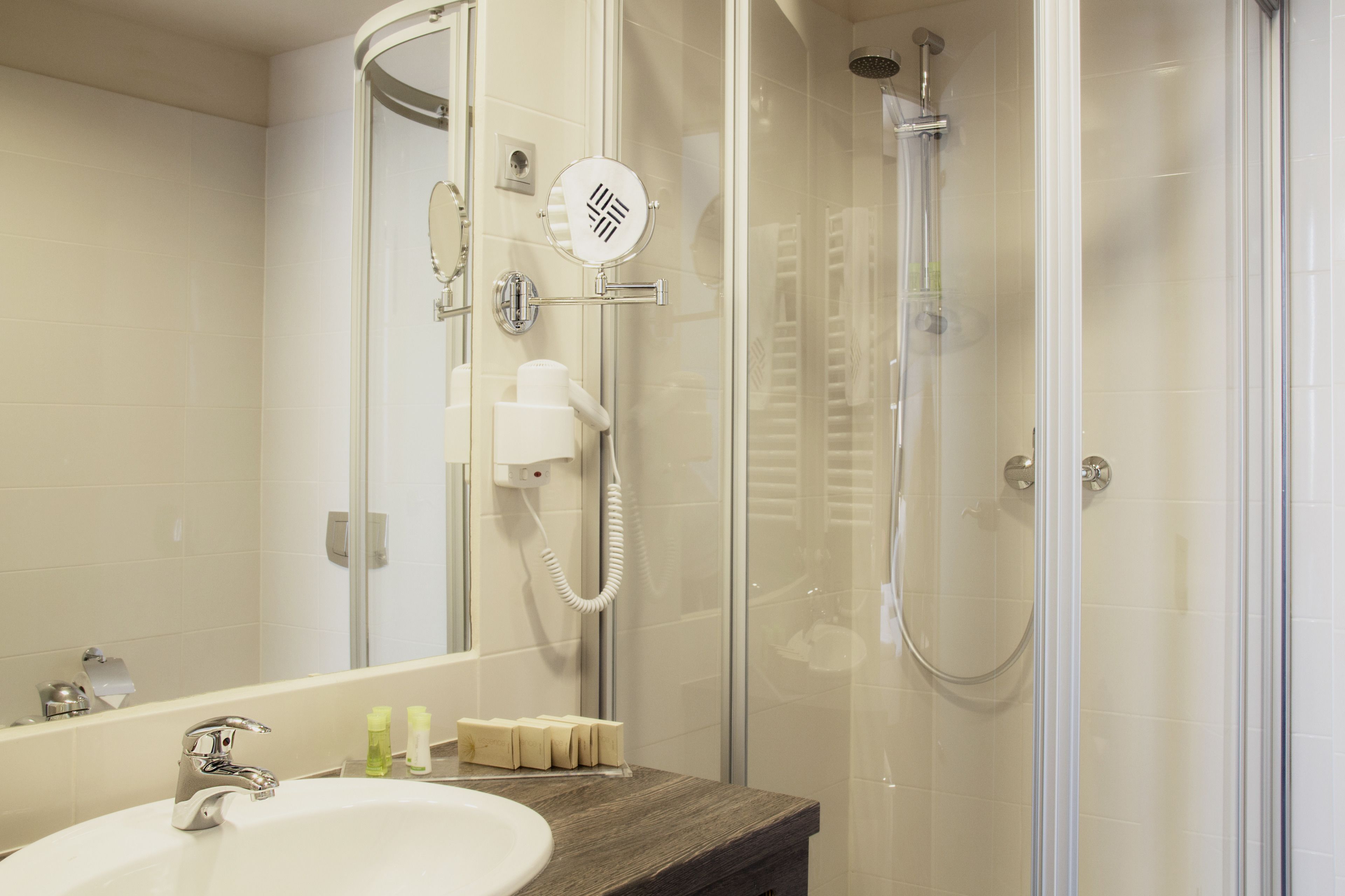 superior single room street view | bathroom | shower, hair dryer, bathrobes, slippers