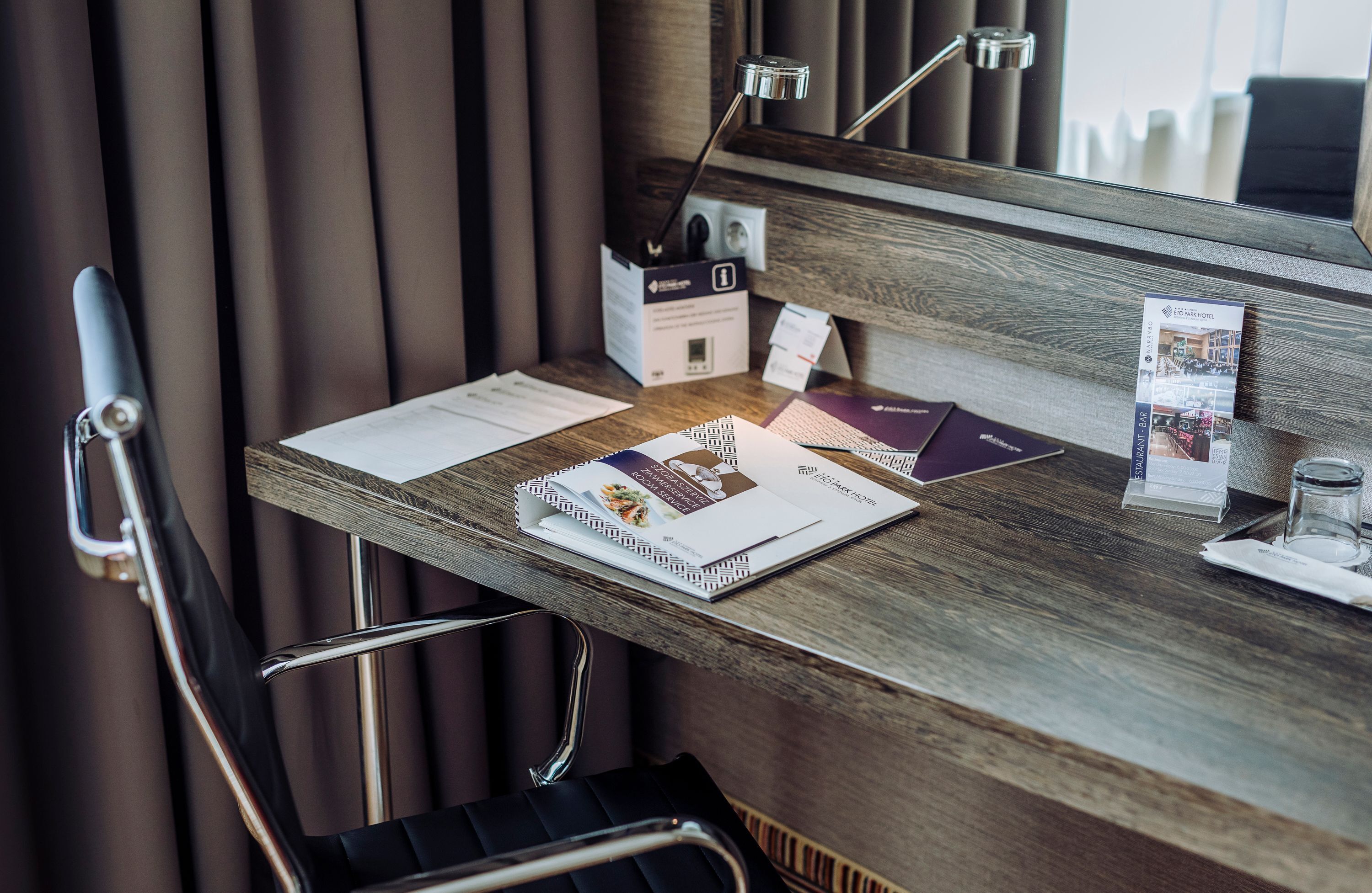 superior double room street view | minibar, in-room safe, desk, laptop workspace