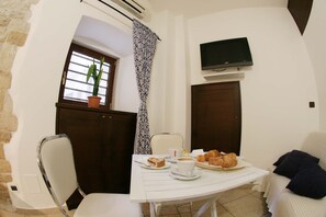 Superior Triple Room, Balcony | Living area | LCD TV