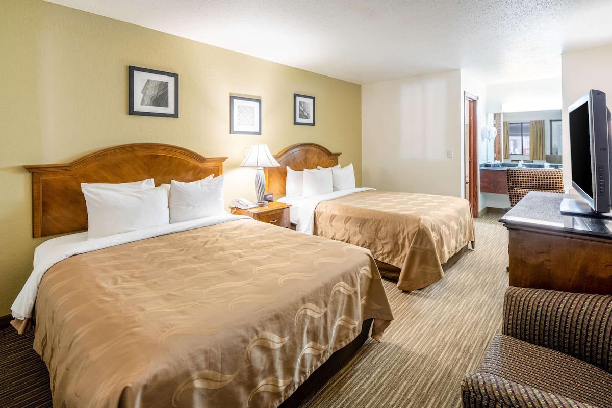 Pillowtop beds, desk, laptop workspace, blackout drapes