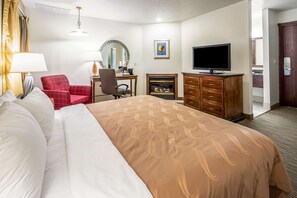 Room, 1 King Bed, Non Smoking, Fireplace | Pillowtop beds, desk, laptop workspace, blackout drapes - Quality Inn Keystone near Mount Rushmore (Keystone)