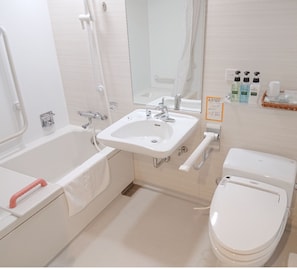 Combined shower/bathtub, free toiletries, bathrobes, slippers