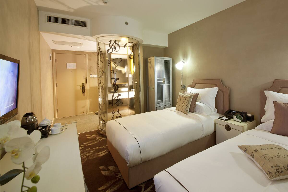 Premium bedding, down comforters, pillowtop beds, in-room safe