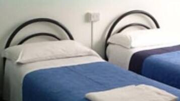 Premium bedding, desk, iron/ironing board, rollaway beds