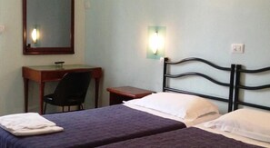 Premium bedding, desk, iron/ironing board, rollaway beds