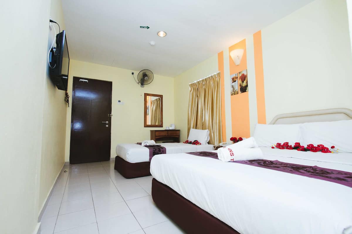 Family Triple Room, 1 Bedroom, Smoking | 1 bedroom, down comforters, desk, laptop workspace