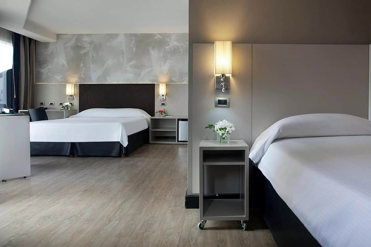 Hypo-allergenic bedding available, down comforters, minibar