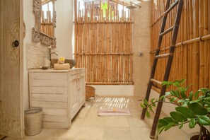 Shower, rainfall showerhead, hair dryer, towels