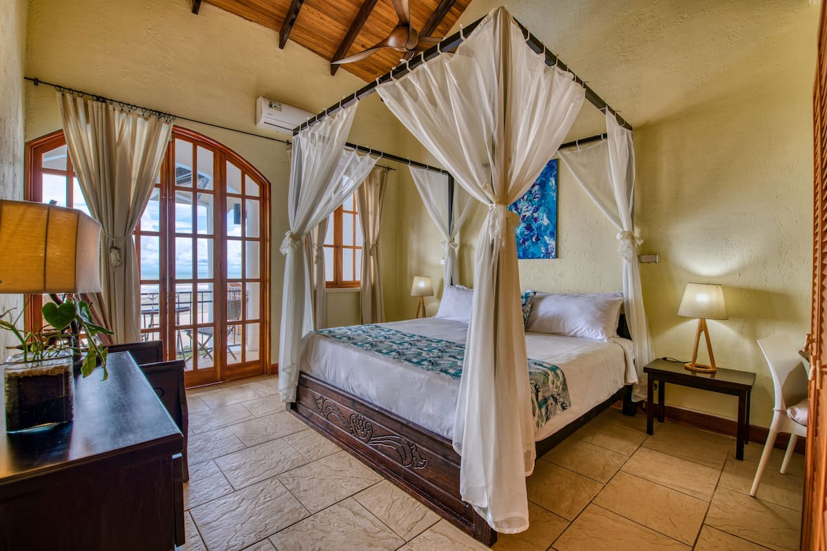 Suite, 1 King Bed, Ocean View | 1 bedroom, in-room safe, desk, free WiFi