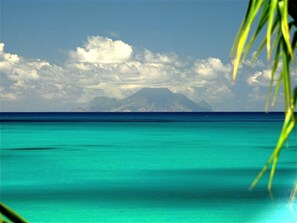 On the beach, sun-loungers, beach umbrellas, beach towels