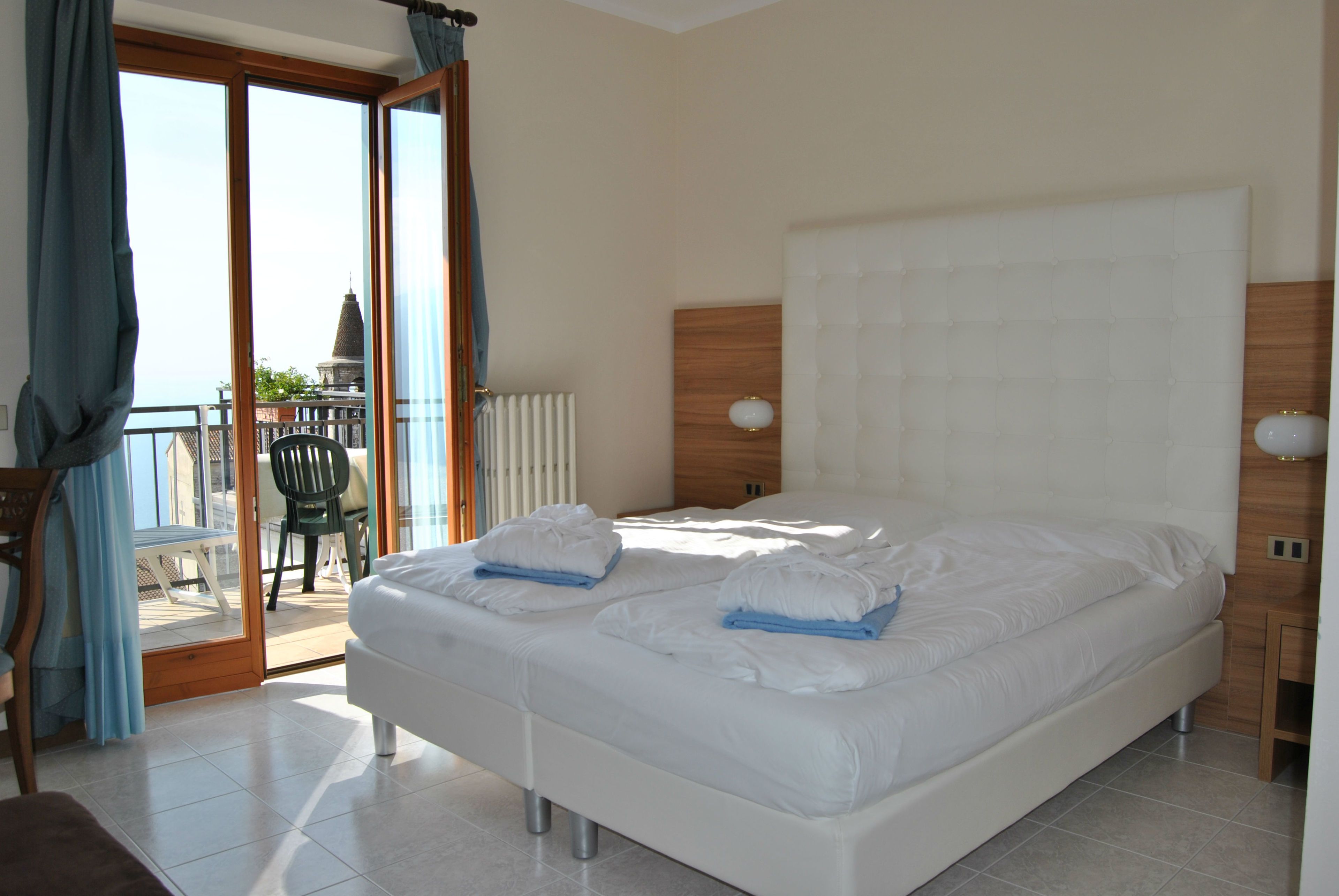 superior double room, lake view | down duvets, in-room safe, desk, free wifi