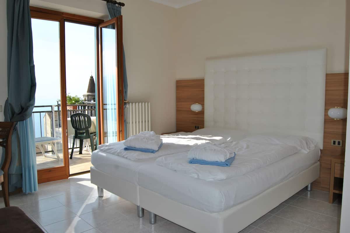 superior double room, lake view | down duvets, in-room safe, desk, free wifi