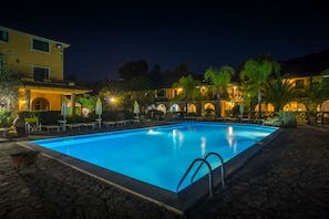 Seasonal outdoor pool, pool umbrellas, pool loungers