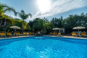 Seasonal outdoor pool, pool umbrellas, sun loungers