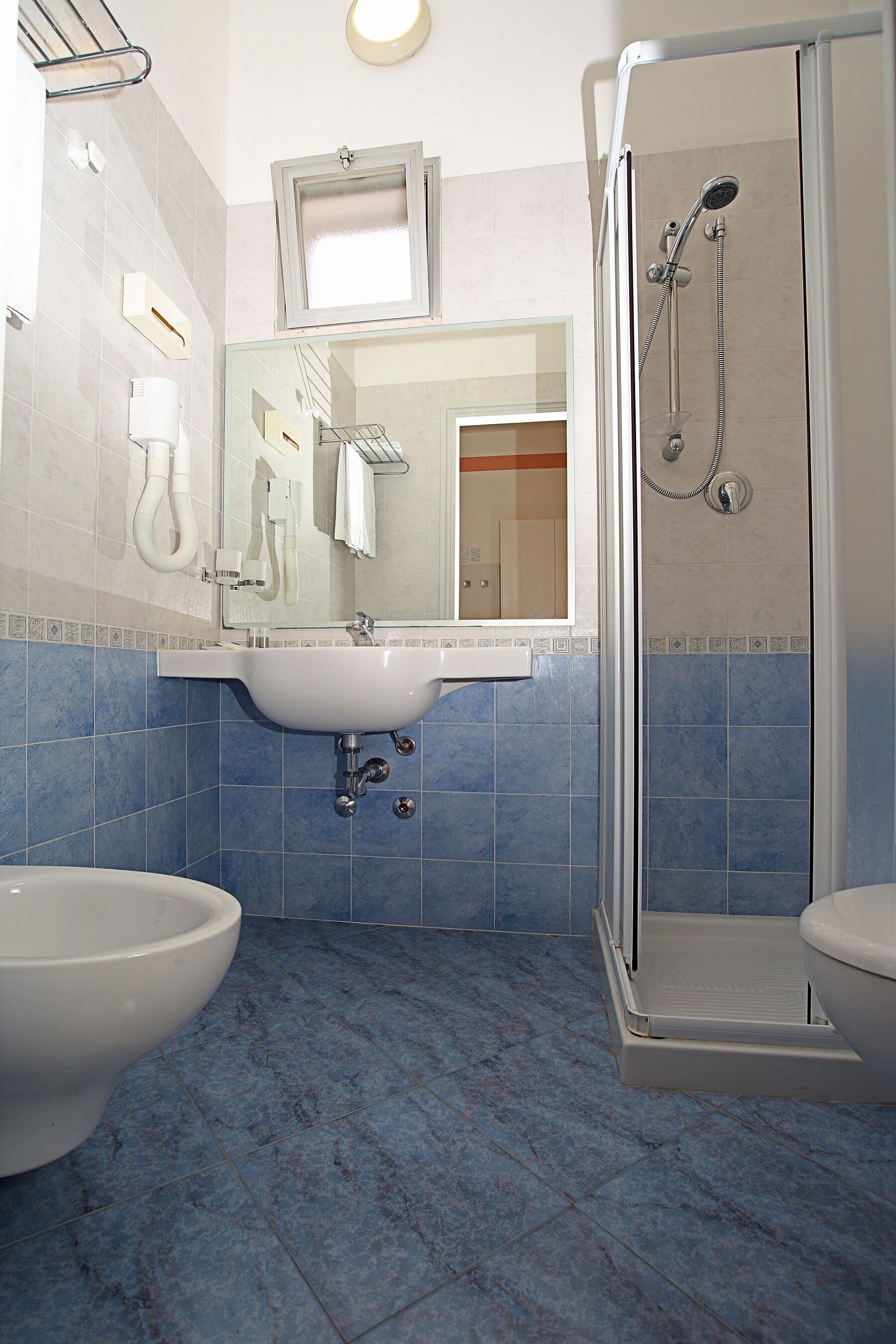 basic double or twin room | bathroom | shower, rainfall showerhead, free toiletries, hair dryer
