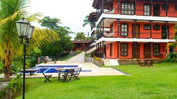 Seasonal outdoor pool, open 7 AM to 9 PM, pool umbrellas, sun loungers