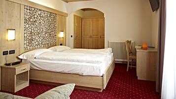 Tripla Comfort | Copriletto in piuma, materassi in memory foam, una cassaforte in camera