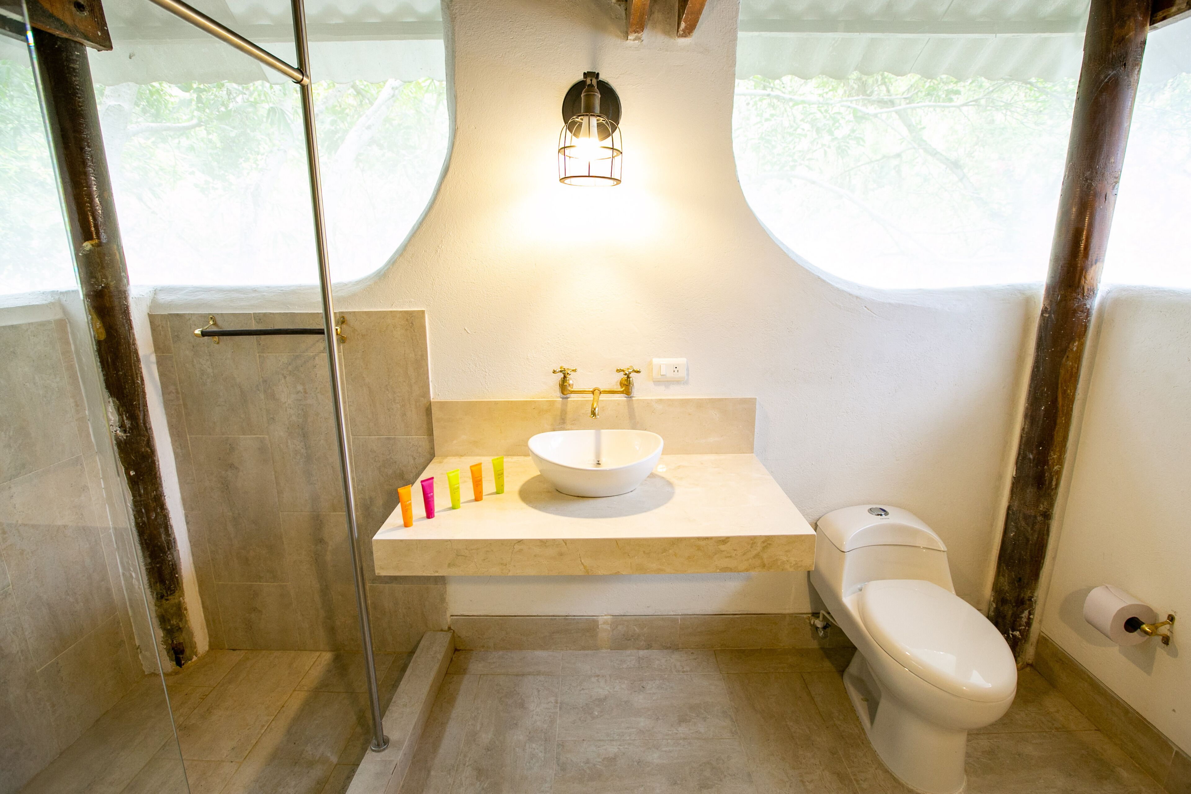 superior bungalow, multiple beds | bathroom | shower, rainfall showerhead, hair dryer, towels