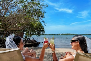 Private beach, beach shuttle, sun loungers, beach umbrellas