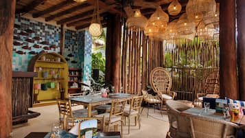 Breakfast, lunch, dinner served; Caribbean cuisine, beach views