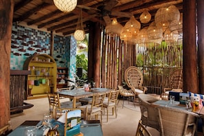 Breakfast, lunch, dinner served; Caribbean cuisine, beach views