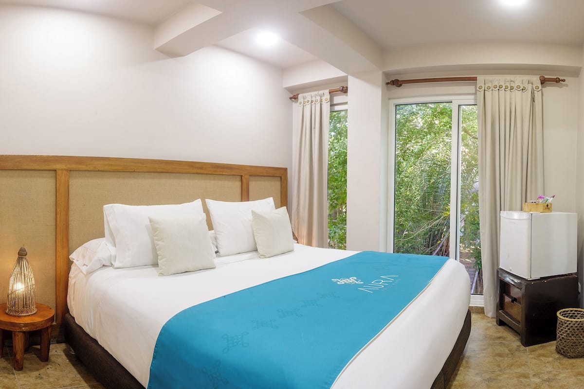 Economy-Doppelzimmer, 1 Doppelbett | Minibar, Zimmersafe, individuell eingerichtet, Bügeleisen/Bügelbrett