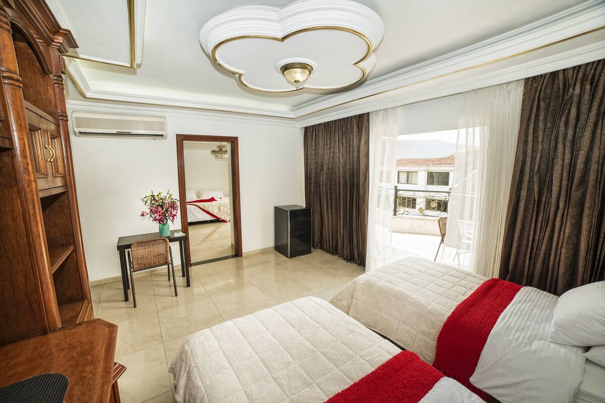 Family Room | Premium bedding, down duvets, in-room safe, desk