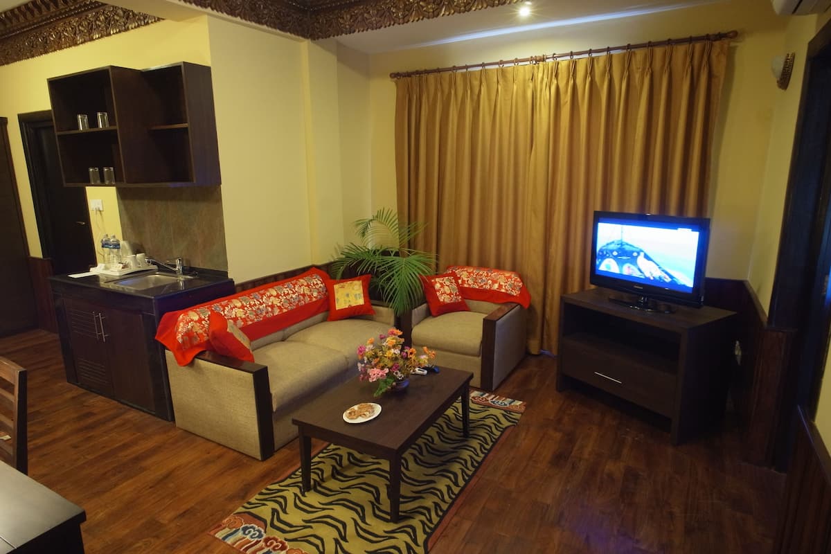 tibetan boutique suites | premium bedding, select comfort beds, minibar, in-room safe