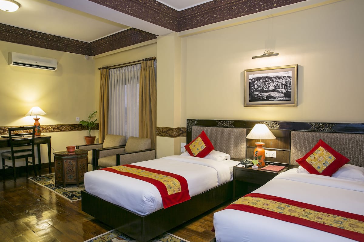Tibetan Boutique Rooms | Premium bedding, Select Comfort beds, minibar, in-room safe