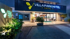 Villa Park Hotel Natal with a modern facade, large windows, and a well-lit entrance. - Villa Park Hotel Natal (Natal)