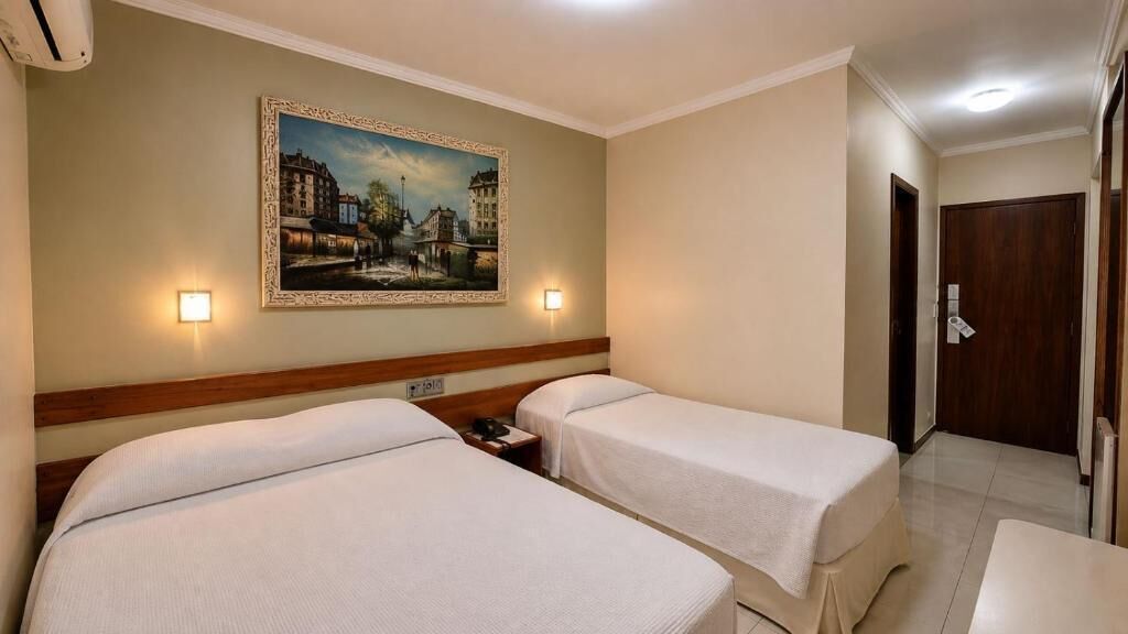 Deluxe Triple Room, 1 Double,1 Single Bed | Minibar, in-room safe, desk, WiFi (free)