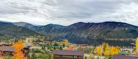 A mountainous landscape with a lake and a small town.