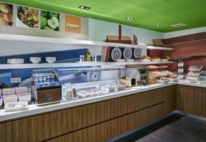 A breakfast buffet with various food items and condiments. - Holiday Inn Express Utrecht - Papendorp by IHG (Utrecht)