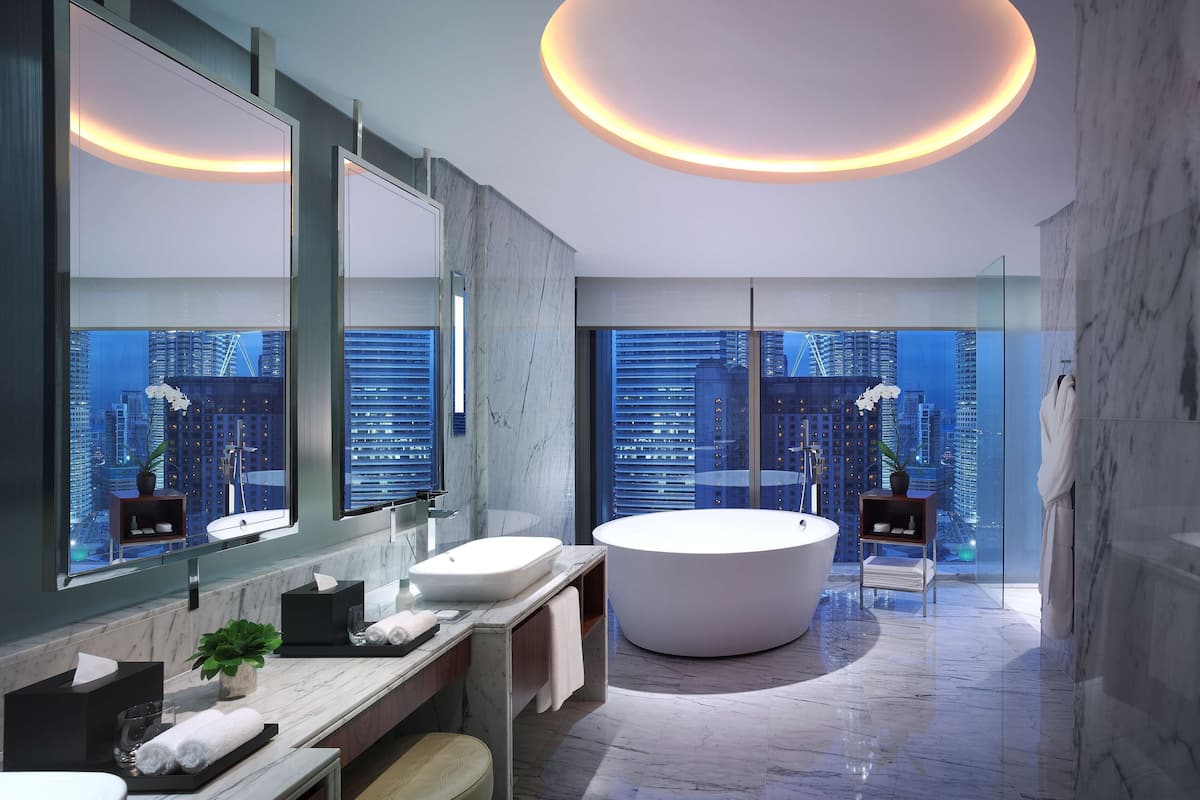 separate bathtub and shower, rainfall showerhead, designer toiletries
