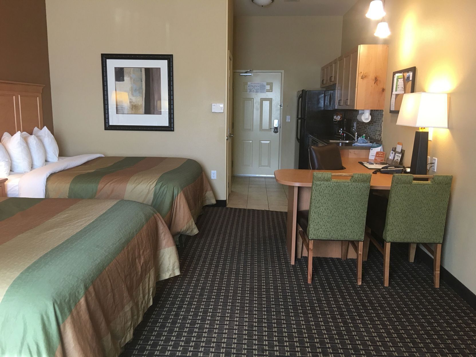 Desk, blackout drapes, iron/ironing board, rollaway beds