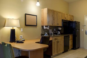 Desk, blackout curtains, iron/ironing board, rollaway beds