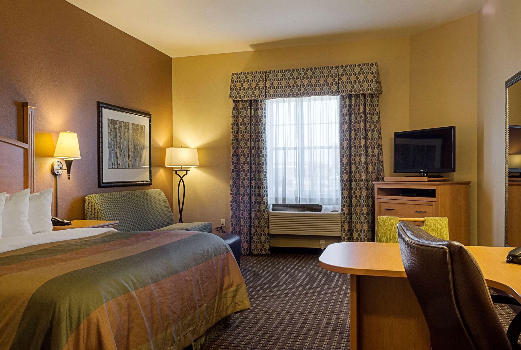Desk, blackout drapes, iron/ironing board, rollaway beds