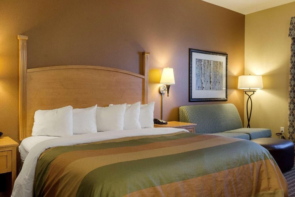 Desk, blackout drapes, iron/ironing board, rollaway beds