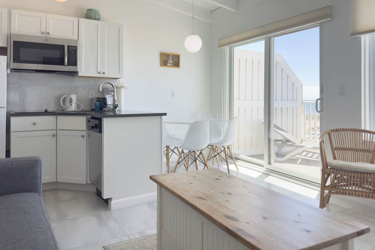 Appartement, uitzicht op zee | Woonruimte | Televisie