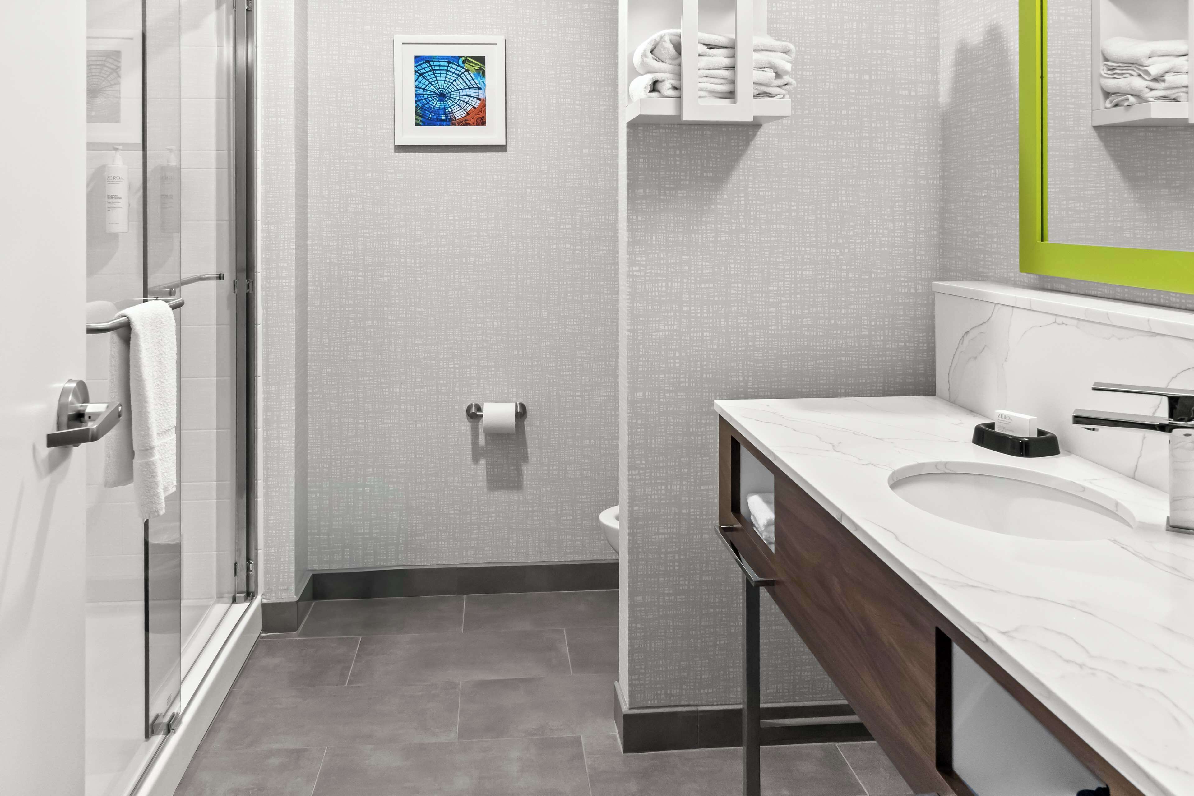 combined shower/bathtub, free toiletries, hair dryer, towels