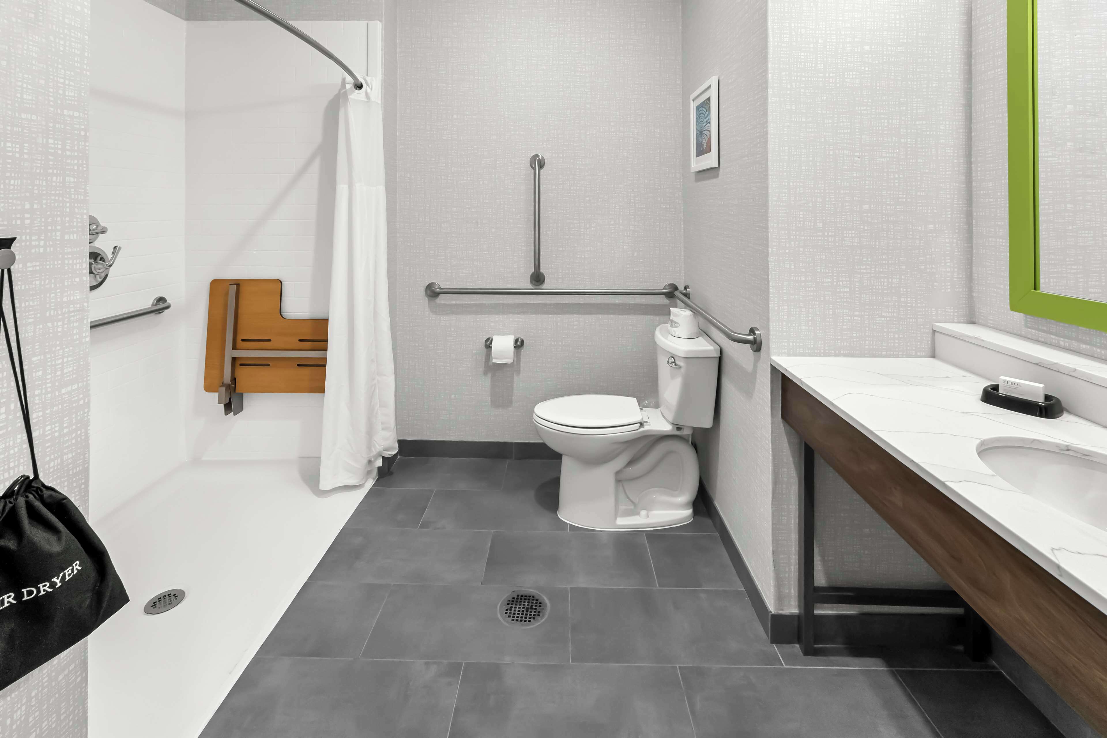 handicap accessible, non-smoking, single king room | bathroom shower